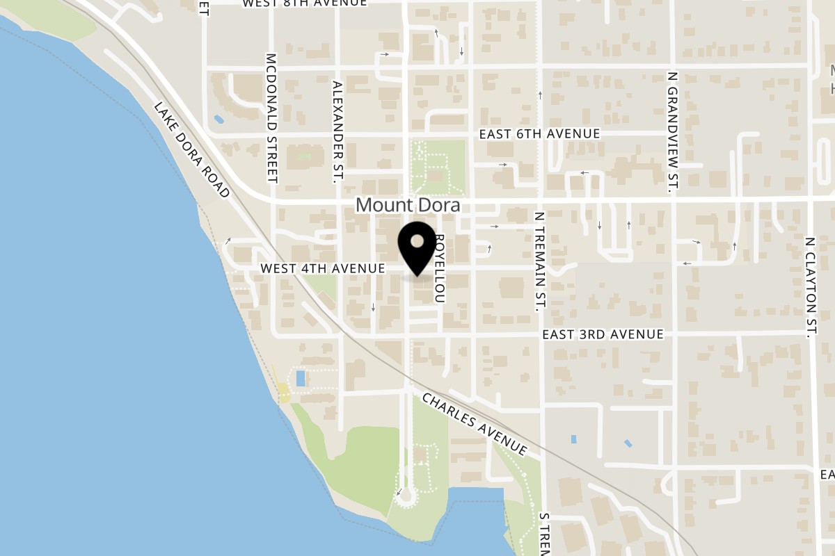 Map showing the location of Munchies Live BBQ on 100 E 4th Ave in Mt Dora
